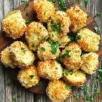 - 1 can (14 oz) artichoke hearts - 1/2 cup freshly grated Parmesan cheese - 1/2 cup Panko breadcrumbs - 3 cloves garlic, finely minced - 2 tablespoons extra virgin olive oil - 1 teaspoon Italian seasoning blend - Salt and freshly ground black pepper, to taste - Fresh parsley for garnishing - Air fryer - Mixing bowls - Measuring cups and spoons - Tongs or fork for handling - Spatula for serving The ingredients are simple yet full of flavor. The artichoke hearts are the star here. They bring a unique taste and texture. I always use freshly grated Parmesan cheese for the best flavor. The Panko breadcrumbs add a delightful crunch. Garlic adds a rich, savory note. The olive oil helps everything stick and crisps up beautifully. You can find all these ingredients at your local store. If you want to make it a bit healthier, use less cheese or oil. However, I recommend sticking to the recipe the first time. It’s all about getting that perfect crispy texture! - Set the temperature to 375°F (190°C) - Allow 5 minutes for preheating First, we need to preheat the air fryer. This step helps get our artichokes crispy. Set the temperature to 375°F (190°C) and wait for about 5 minutes. - Combine Parmesan cheese, Panko, minced garlic, Italian seasoning, salt, and pepper - Stir until evenly mixed Next, let’s make the breadcrumb mixture. In a medium bowl, mix together the freshly grated Parmesan cheese, Panko breadcrumbs, minced garlic, Italian seasoning, salt, and pepper. Stir it well until everything is evenly mixed. This mixture will give our artichokes a nice crunch and flavor. - Toss artichoke hearts in olive oil - Dip each heart in the breadcrumb mixture ensuring even coverage Now, we coat the artichoke hearts. First, toss the drained artichoke hearts in olive oil. This helps the breadcrumbs stick. Then, dip each heart into the breadcrumb mix. Press slightly to make sure the crumbs stick well. - Arrange in a single layer in the air fryer basket - Cook for 10-12 minutes, shaking halfway through It’s time to air fry! Place the coated artichoke hearts in a single layer in the air fryer basket. Cook them for 10 to 12 minutes. Halfway through, shake the basket to help them crisp on all sides. - Remove from air fryer and cool for a minute - Sprinkle with freshly chopped parsley When they finish cooking, carefully take the artichoke hearts out. Let them cool for a minute. To make them look fancy, sprinkle with freshly chopped parsley before serving. Enjoy your crispy garlic Parmesan artichoke hearts! - Use Panko breadcrumbs for extra crunch. - Ensure artichoke hearts are thoroughly drained. - Do not overcrowd the air fryer basket. To get that perfect crunch, Panko breadcrumbs are key. They create a light and crispy layer. Make sure your artichoke hearts are dried well. Any extra moisture can lead to sogginess. When you place the hearts in the air fryer, give them space. Overcrowding can keep them from getting crispy. - Experiment with different herbs like rosemary or thyme. - Add chili flakes for a spicy kick. Adding herbs can really boost the flavor. Rosemary and thyme pair well with artichokes. If you like heat, sprinkle in some chili flakes. This little change can make a big difference. - Pair with marinara sauce or aioli for dipping. - Serve with a fresh salad or as an appetizer platter. These crispy bites shine when you dip them. Marinara sauce or aioli makes a tasty match. You can also place them on a platter with salad for a great meal. They work well as a snack or at a party! {{image_4}} You can easily make this dish gluten-free. Just swap regular breadcrumbs for gluten-free breadcrumbs. This keeps the crunch while catering to those with dietary needs. Want an extra cheesy treat? Add shredded mozzarella cheese to the breadcrumb mix. This gives a gooey texture that melts in your mouth. You can also switch up the cheese. Try asiago or gouda for a different taste experience. Both add a rich flavor that complements the artichokes. If you love heat, add some spice to your artichoke hearts. Mix hot sauce or sriracha into the olive oil. This gives each piece a spicy kick. You can also add crushed jalapeños to the breadcrumb mix. This will make each bite a fiery delight. Store any leftover air fryer crispy garlic Parmesan artichoke hearts in an airtight container in the fridge. This keeps them fresh and tasty. You should eat them within 2-3 days for the best flavor. To bring back the crispiness, reheat your artichoke hearts in the air fryer. Just a few minutes will do the trick. Avoid using the microwave, as it can make them soggy and less enjoyable. For easy meals later, freeze raw coated artichoke hearts. Just be sure to thaw them before air frying. This way, you can enjoy a quick and tasty snack whenever you want! Yes, but thaw and drain them well before coating. Frozen artichokes often hold extra moisture. If you skip this step, they may not crisp up well. Take your time to ensure they are dry. This step is key for the best texture. Substitute cheese with vegan parmesan and use a plant-based oil. There are many tasty vegan cheeses. Look for one that melts well. This keeps the flavor while making it vegan-friendly. Great as an appetizer, or serve with pasta, salad, or as part of a charcuterie board. They add a nice crunch and flavor to any meal. Pair them with marinara or aioli for a dipping option. They should be golden brown and crispy on the outside, tender on the inside. Check them at the 10-minute mark. If they need more time, keep an eye on them. Don't let them burn! You can now make tasty air-fried artichoke hearts with ease. Start with simple ingredients like artichokes, cheese, and breadcrumbs. Follow the steps to prepare and cook them quickly in your air fryer. Remember, you can customize flavors and keep leftovers for later. Enjoy these crunchy bites as an appetizer or a snack. I hope you try this recipe and savor the great taste you've created. Happy cooking!